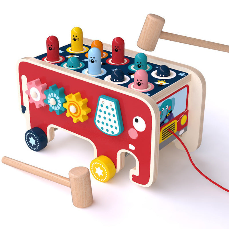 Colorful wooden pounding bench toy featuring cute animal designs for toddlers, promoting motor skills and sensory development.