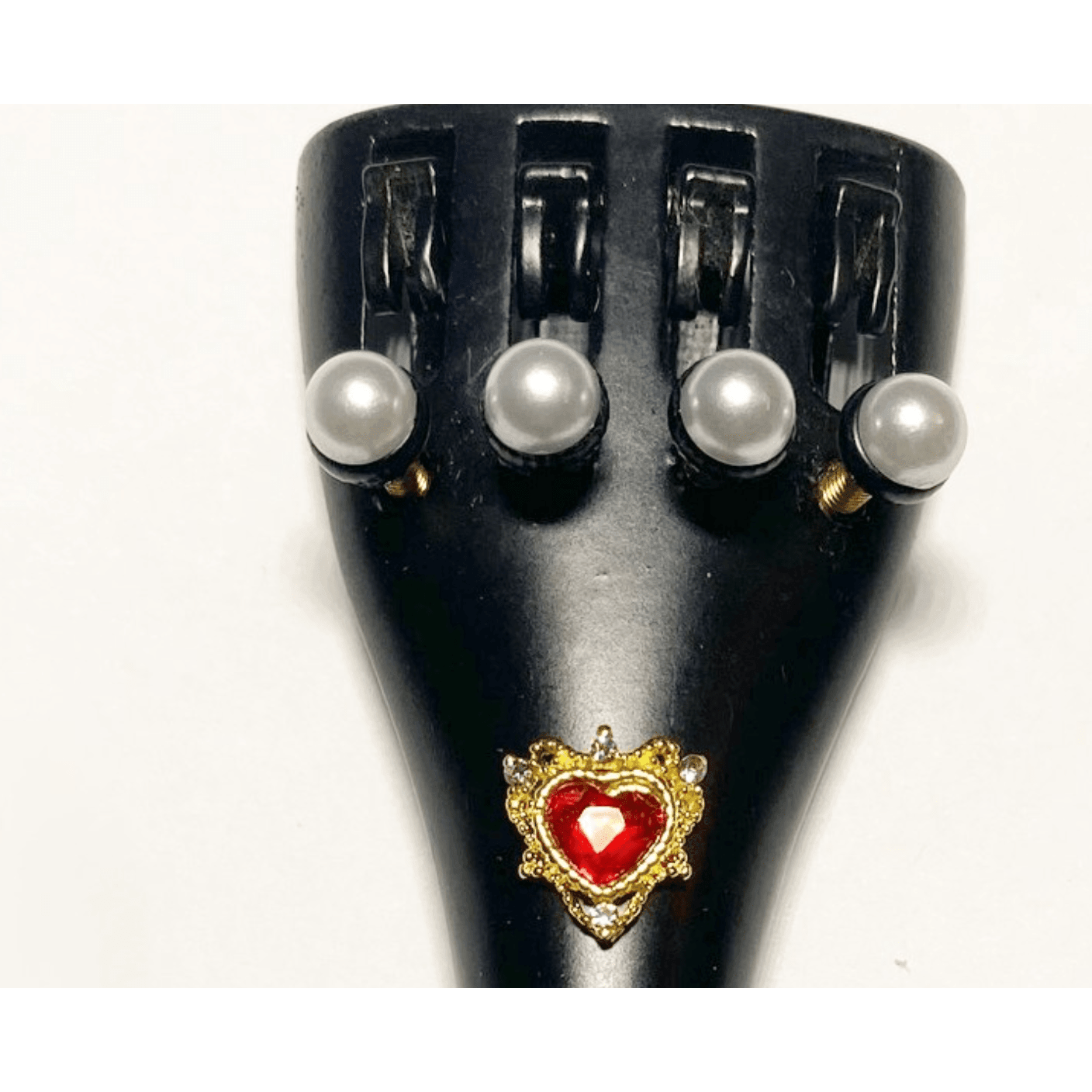 Valentine Heart Tailpiece featuring intricate heart designs, faux crystal accents, and pearl tuners, perfect for enhancing guitar aesthetics.