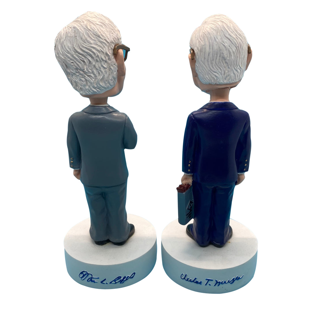 Warren Buffett and Charlie Munger bobblehead set, featuring detailed likenesses of the two legendary investors, approximately 8 inches tall.