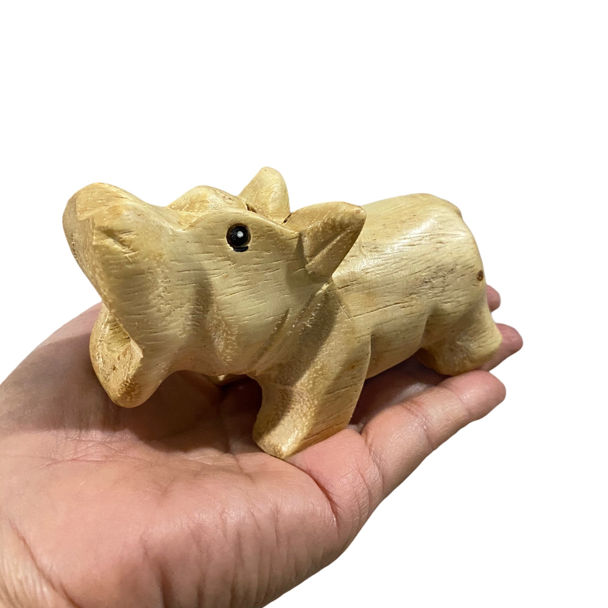 Handcrafted wooden hippo whistle percussion instrument, showcasing intricate details and smooth finish.