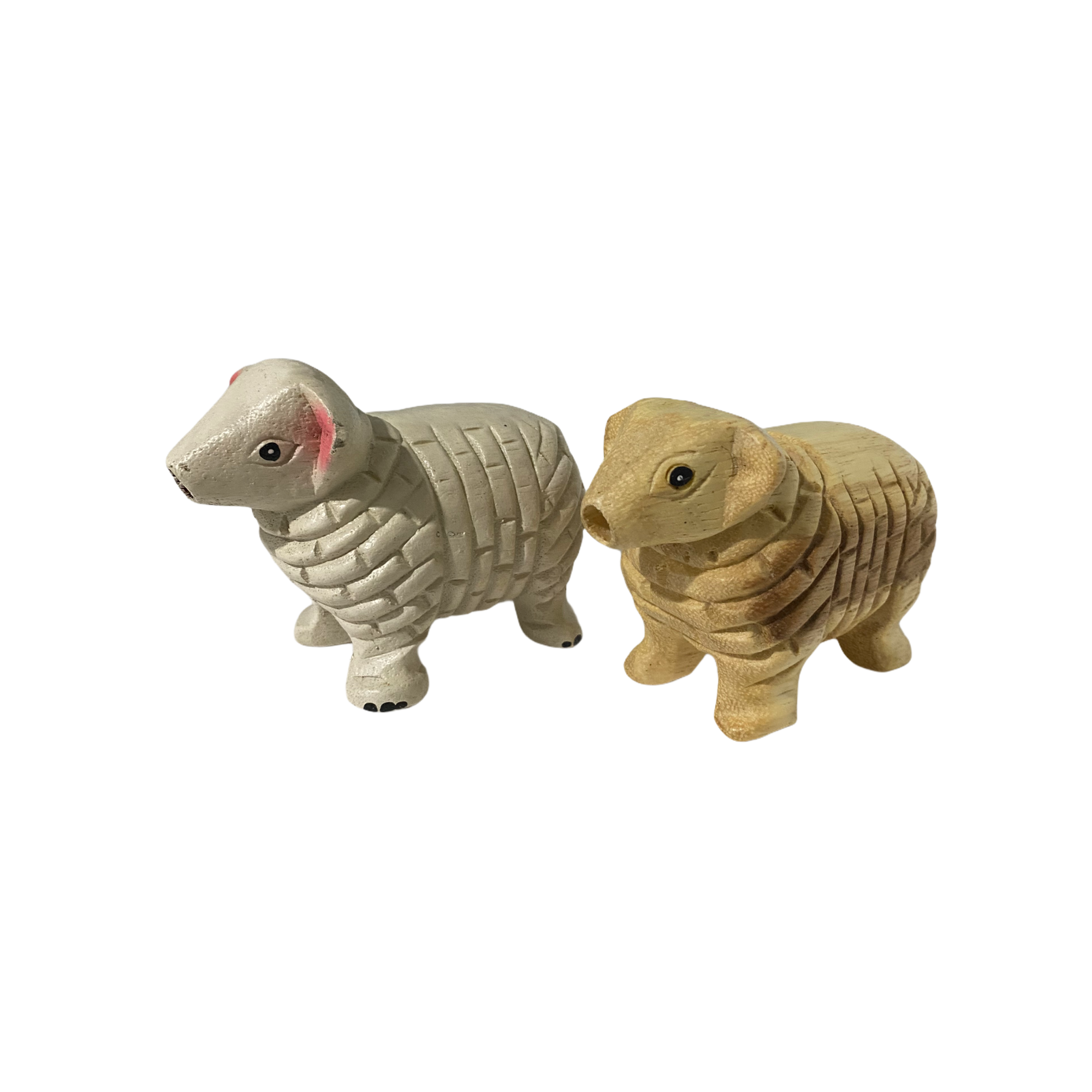 A charming wooden musical whistle shaped like a sheep, showcasing its intricate design and natural wood finish.