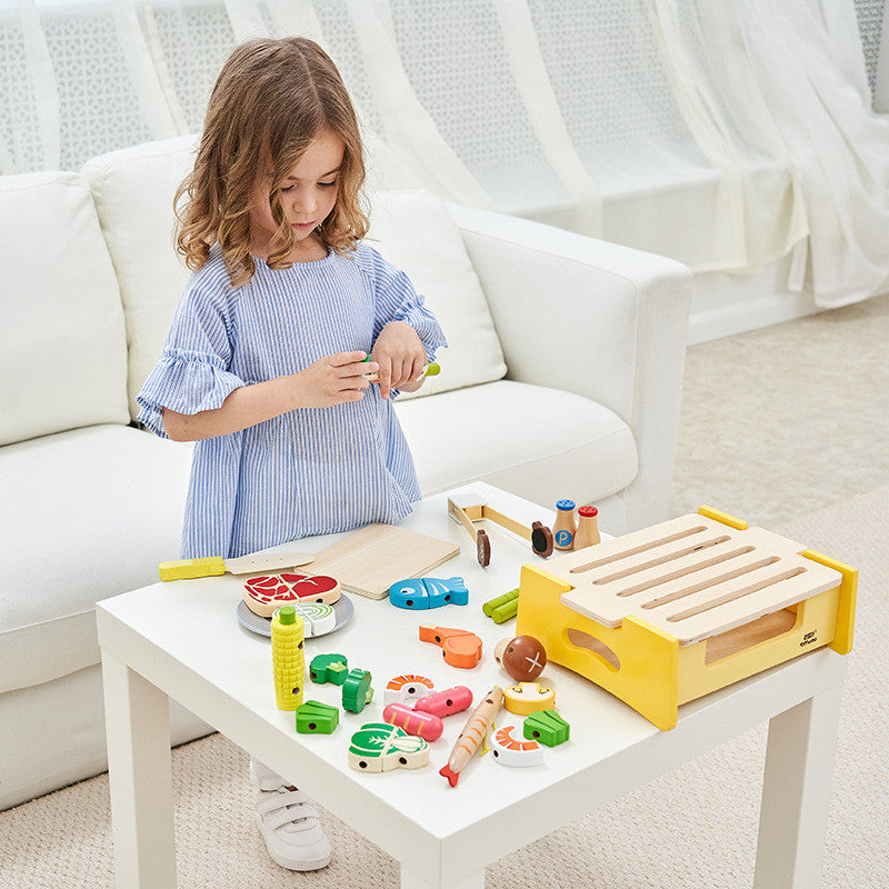 A colorful wooden play kitchen BBQ set toy puzzle featuring various cooking accessories and a barbecue grill, designed for imaginative play.