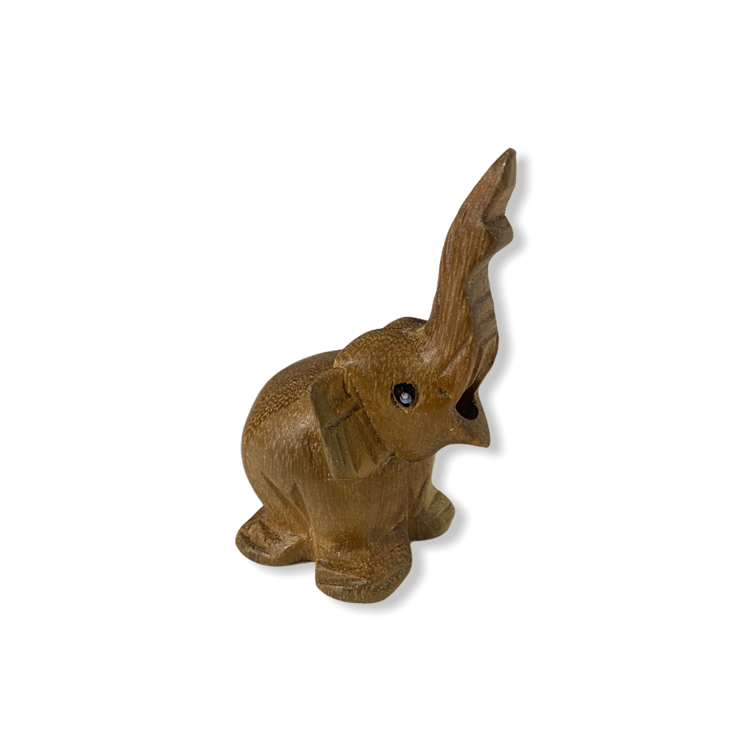 A hand-painted wooden elephant noise maker, standing 5 inches tall, showcasing intricate details and a charming design.
