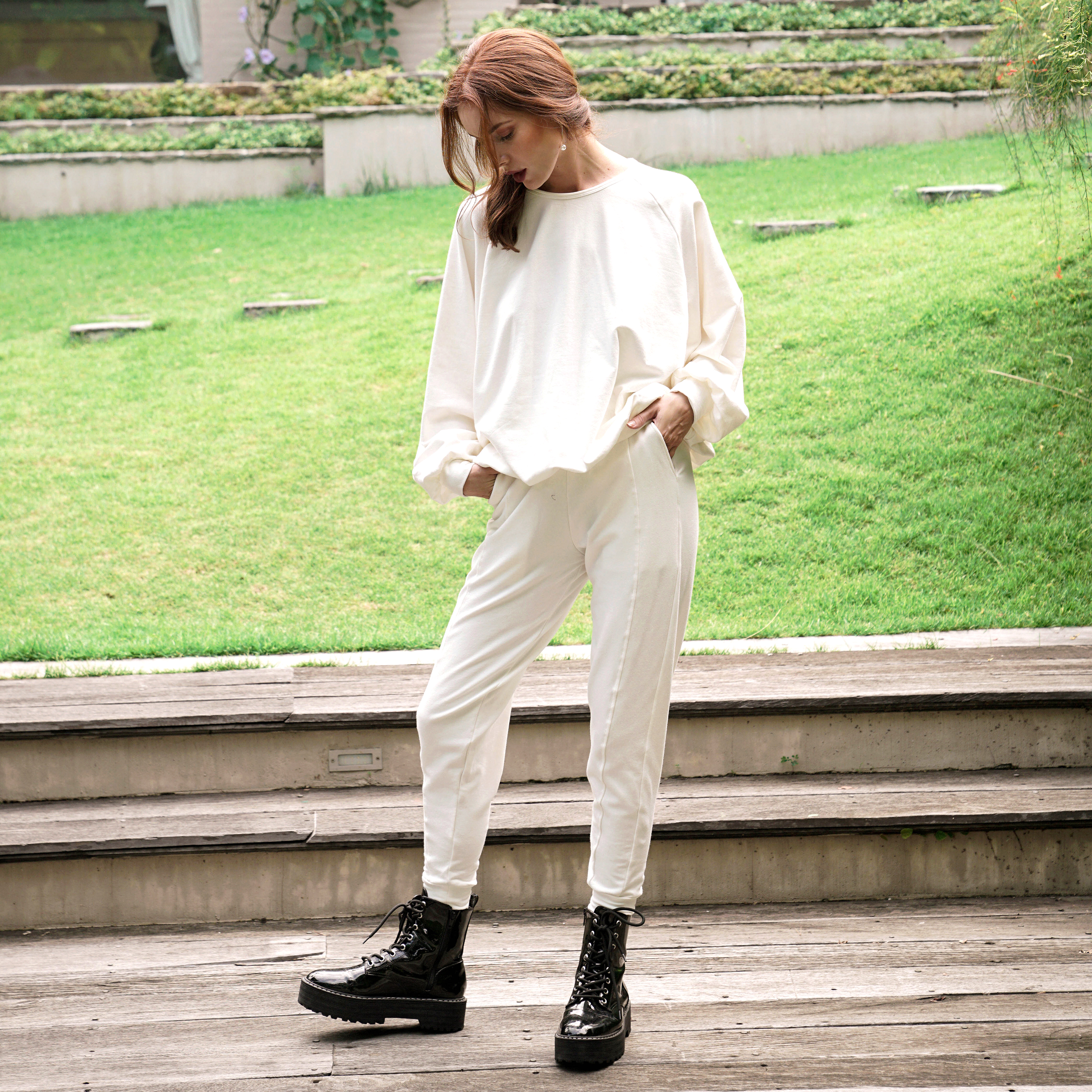 CAMERON Oversized Bamboo Fleece Joggers in white, showcasing soft fabric and spacious side pockets.