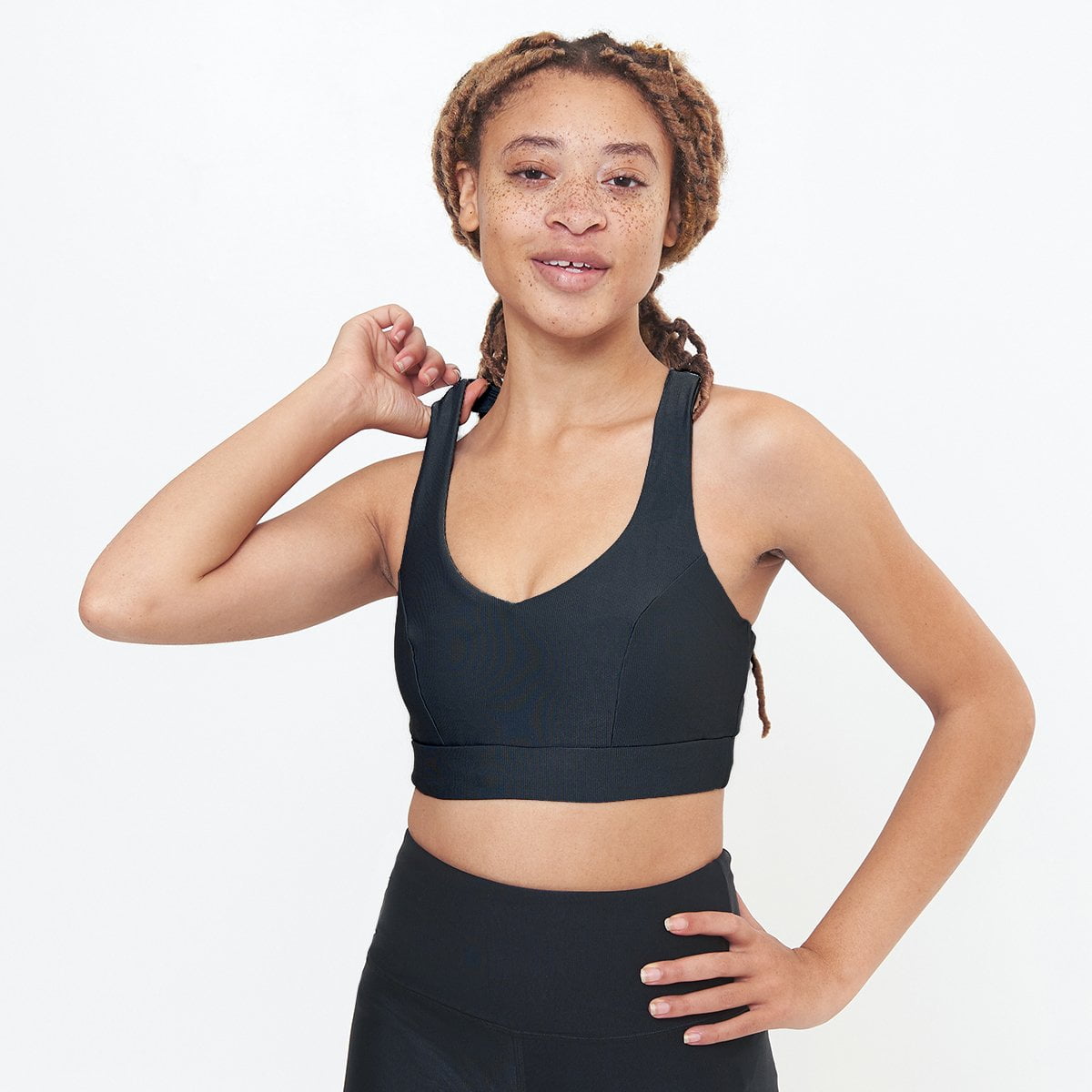 Classic Performance Bra Top in black rib pattern, designed for comfort and support during workouts.
