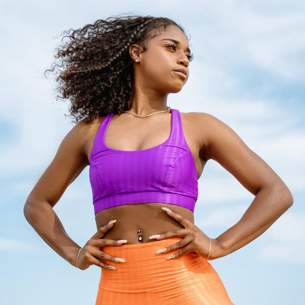 Fuchsia Cross Back Performance Bra Top featuring a stylish Zap pattern, designed for comfort and support during workouts.