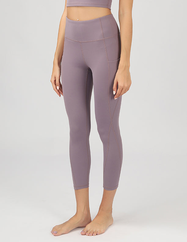 High Waisted Active Leggings in black with side pockets, showcasing 4-way stretch fabric and a flattering fit.