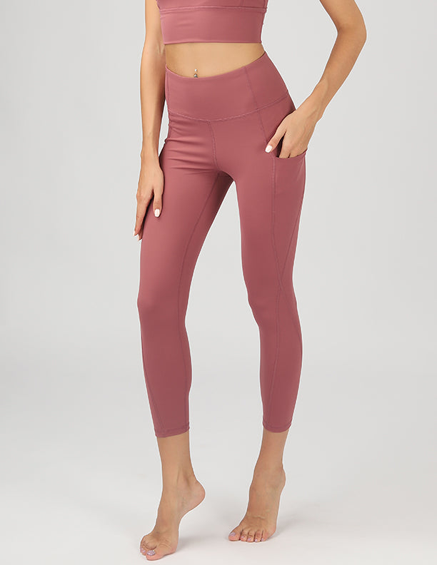 High Waisted Active Leggings in black with side pockets, showcasing 4-way stretch fabric and a flattering fit.