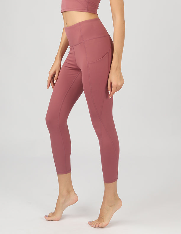 High Waisted Active Leggings in black with side pockets, showcasing 4-way stretch fabric and a flattering fit.