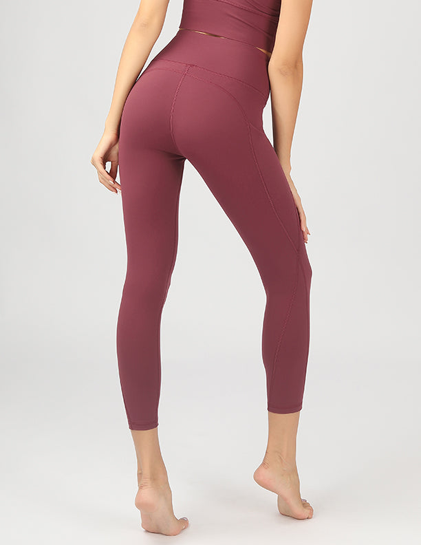 High Waisted Active Leggings in black with side pockets, showcasing 4-way stretch fabric and a flattering fit.