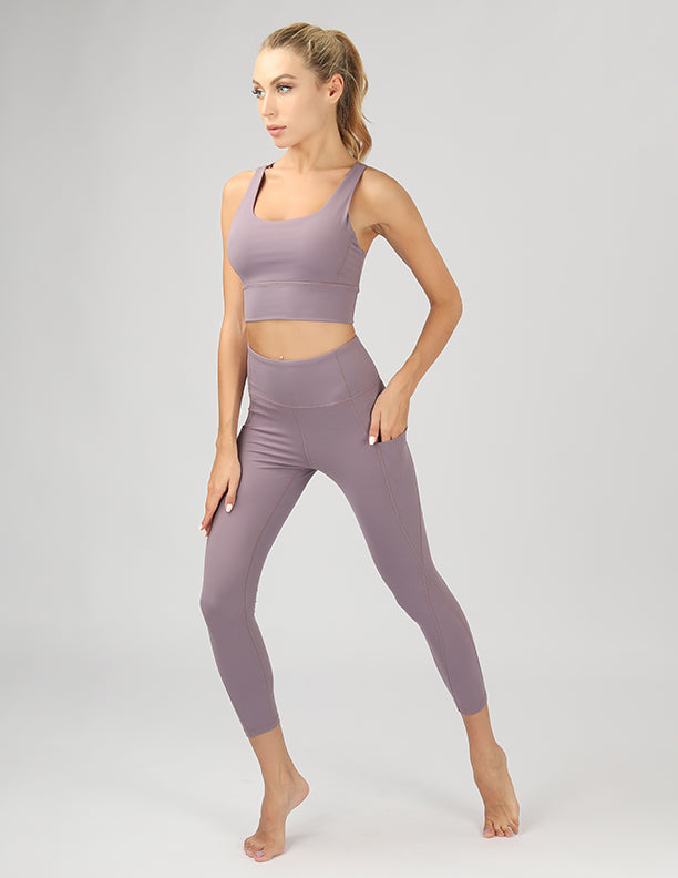 High Waisted Active Leggings in black with side pockets, showcasing 4-way stretch fabric and a flattering fit.