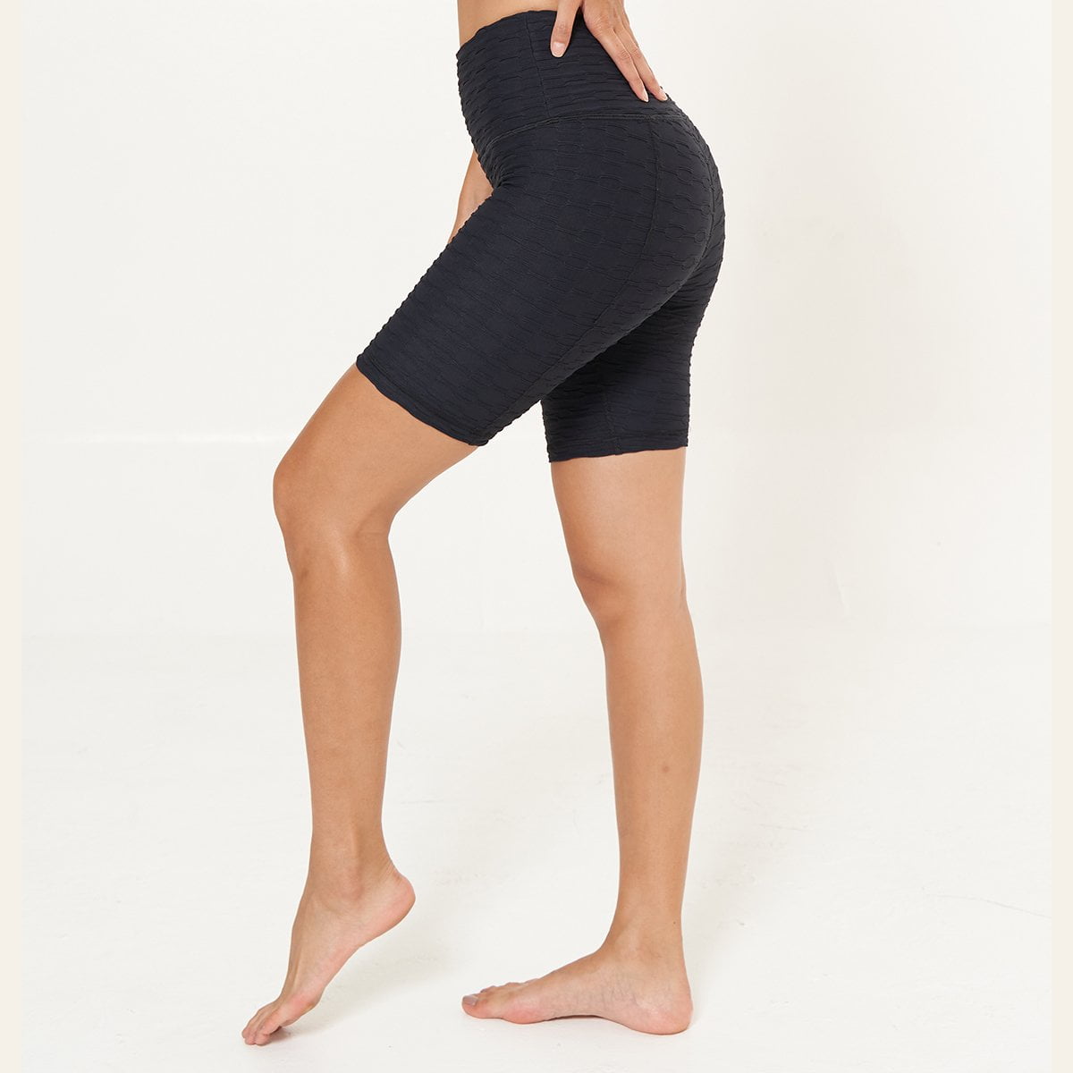 Hi-Rise Biker Short in Black Links Pattern, showcasing a stylish design with a comfortable fit, perfect for active lifestyles.