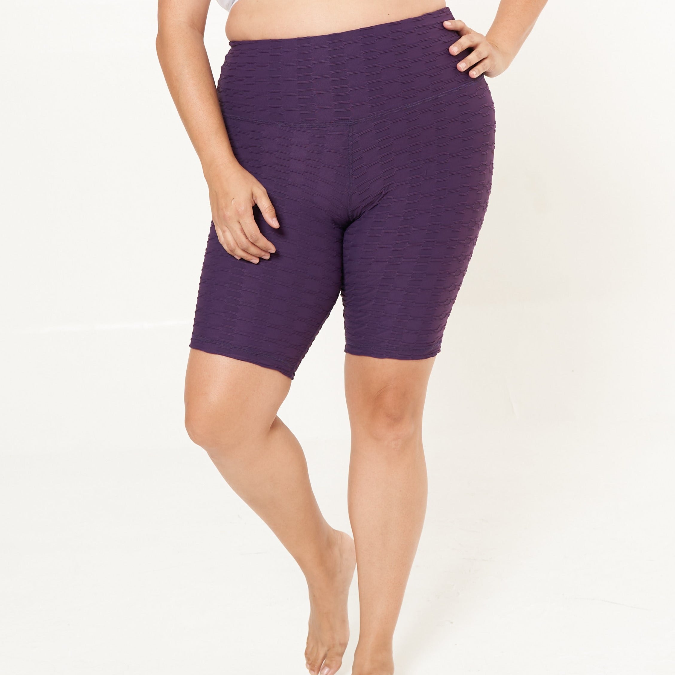 Hi-Rise Biker Short in Eggplant Links Pattern, showcasing a stylish design with a comfortable fit, perfect for active lifestyles.