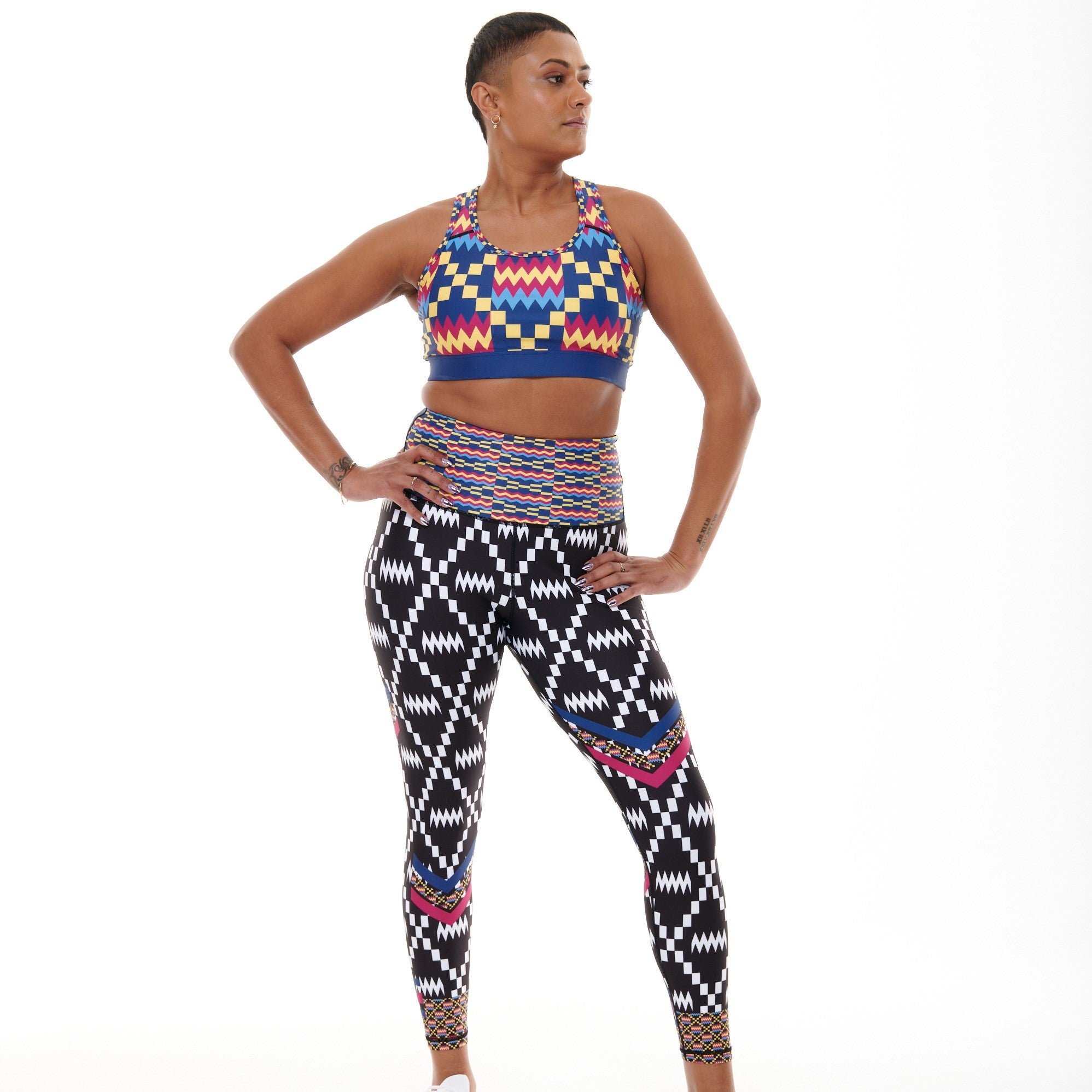 Kayentee Cerulean Splash Leggings featuring vibrant Cerulean Blue, Cerise, Black, and Yellow geometric patterns against a Black and White background.
