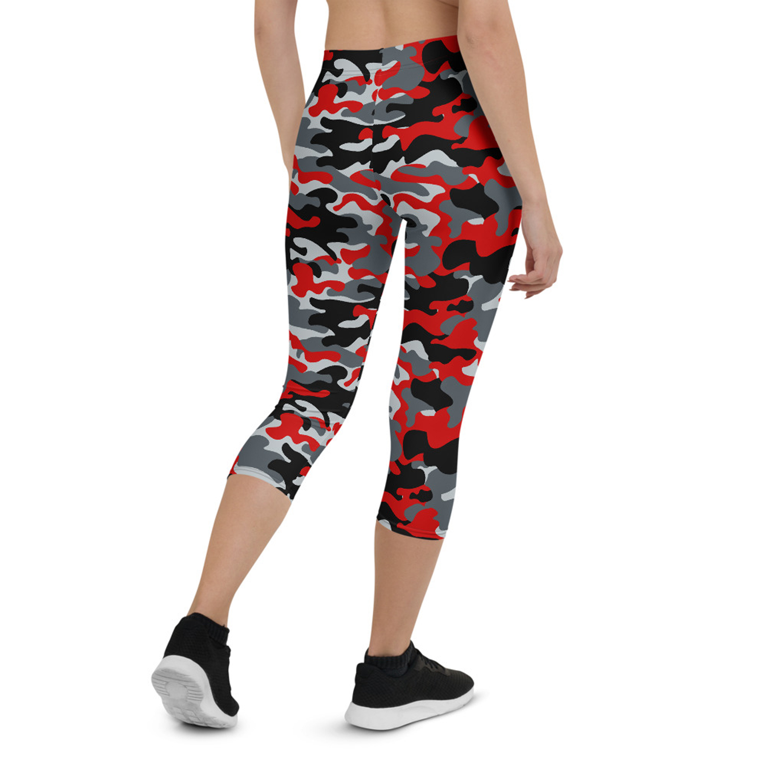 A pair of women's red and gray camo capri leggings, showcasing a unique graphic design, perfect for workouts and casual wear.