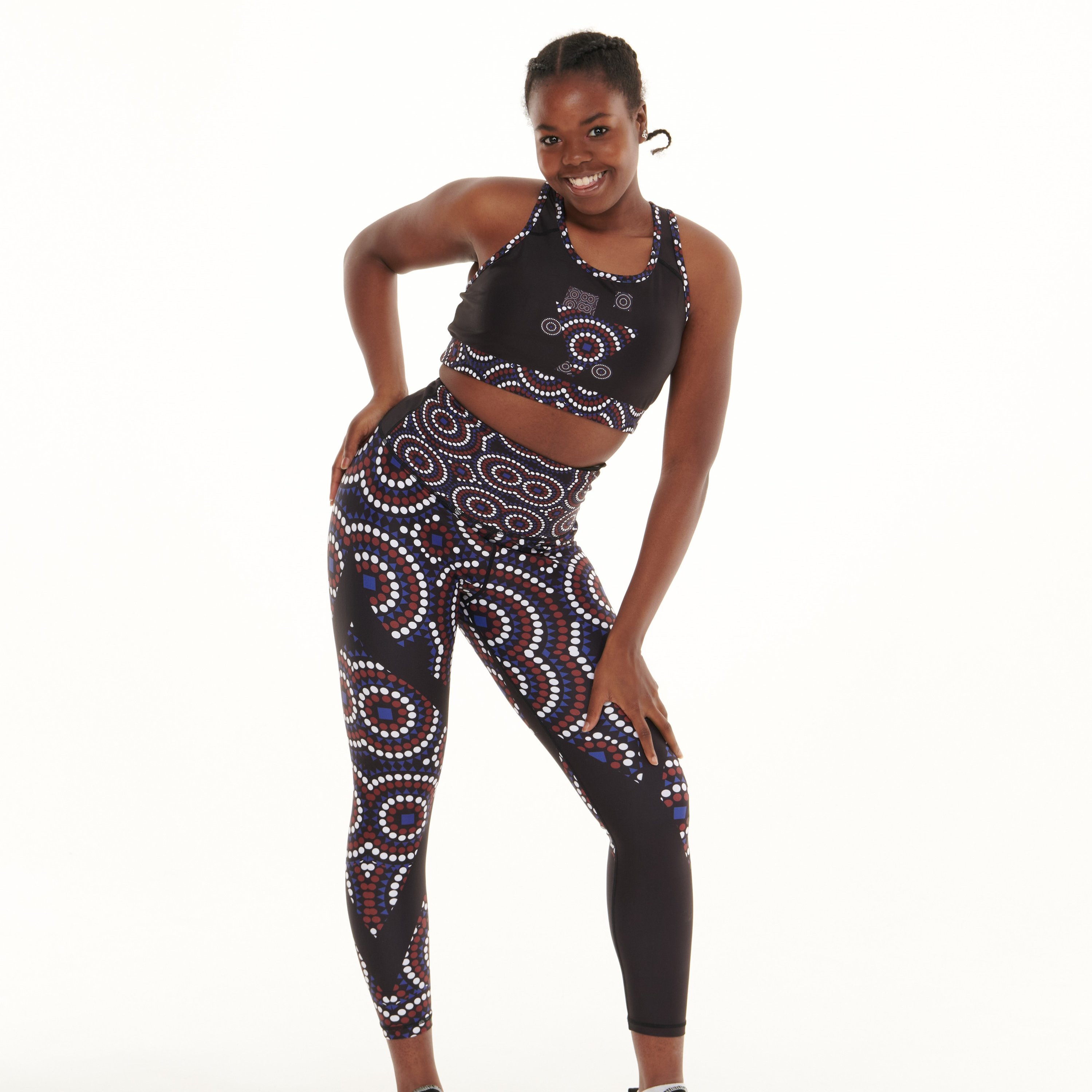 TYNA Signature On Black Vibrant Leggings featuring unique ethnic-inspired print in vibrant colors.