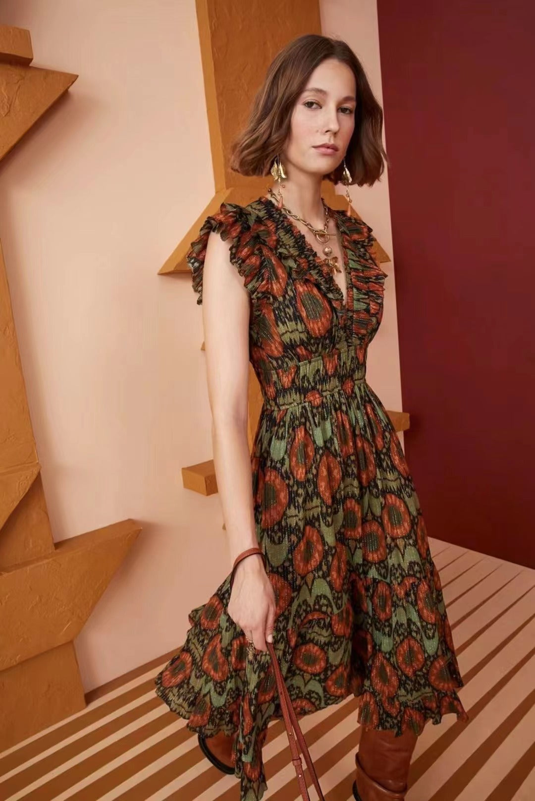 A stylish Abstract Print V-Neck Waist Slim Ruffle Midi Dress showcasing a modern design with a flattering silhouette.