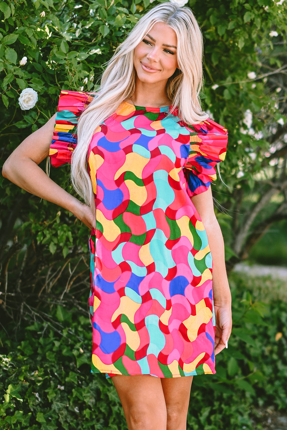 A stylish Abstract Ruffle Sleeve Shift Dress featuring vibrant abstract prints and playful ruffle sleeves, perfect for any occasion.