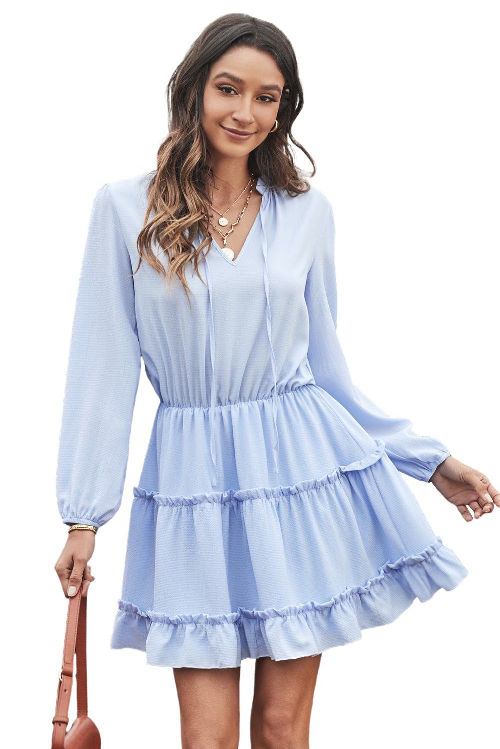 A stylish blue V neck long sleeve mini dress with ruffles and a tiered design, perfect for elegant occasions.