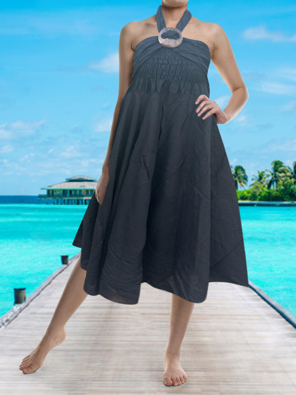 Bohotusk Plain Black Beach Dress featuring a coconut buckle, showcasing its versatility as a dress and skirt.