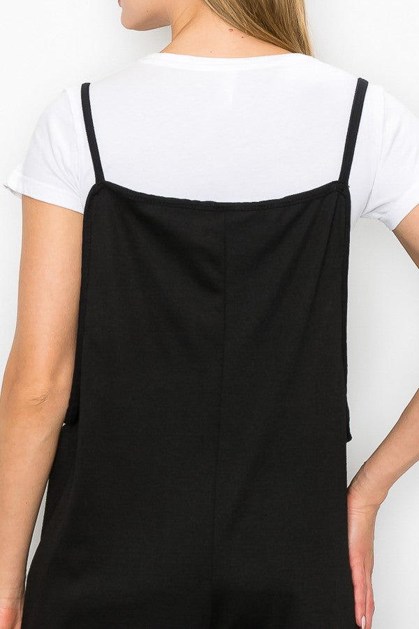 A stylish black cropped bottom wide leg oversized jumpsuit featuring spaghetti straps and a comfortable fit, perfect for casual and semi-formal occasions.