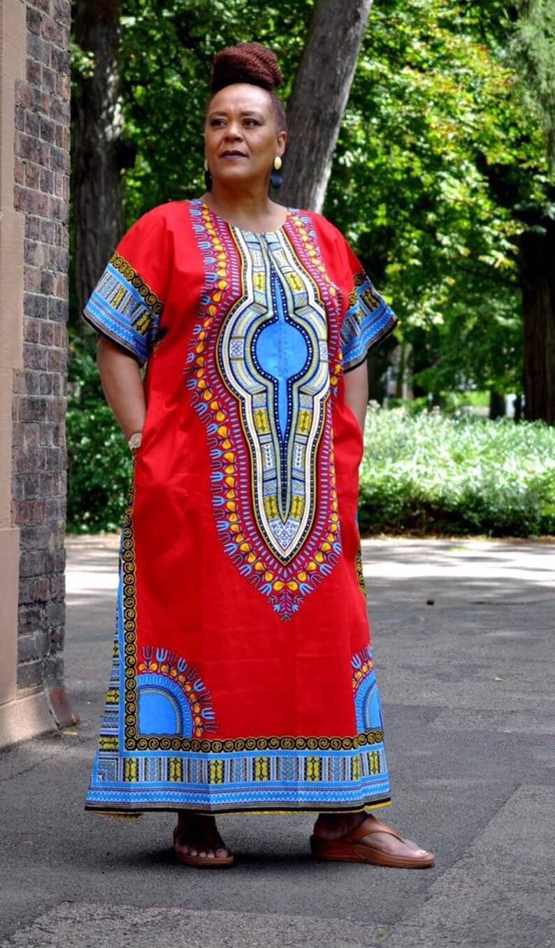 A vibrant red Dashiki kaftan maxi dress featuring traditional African prints on the front and back, made from lightweight cotton fabric.