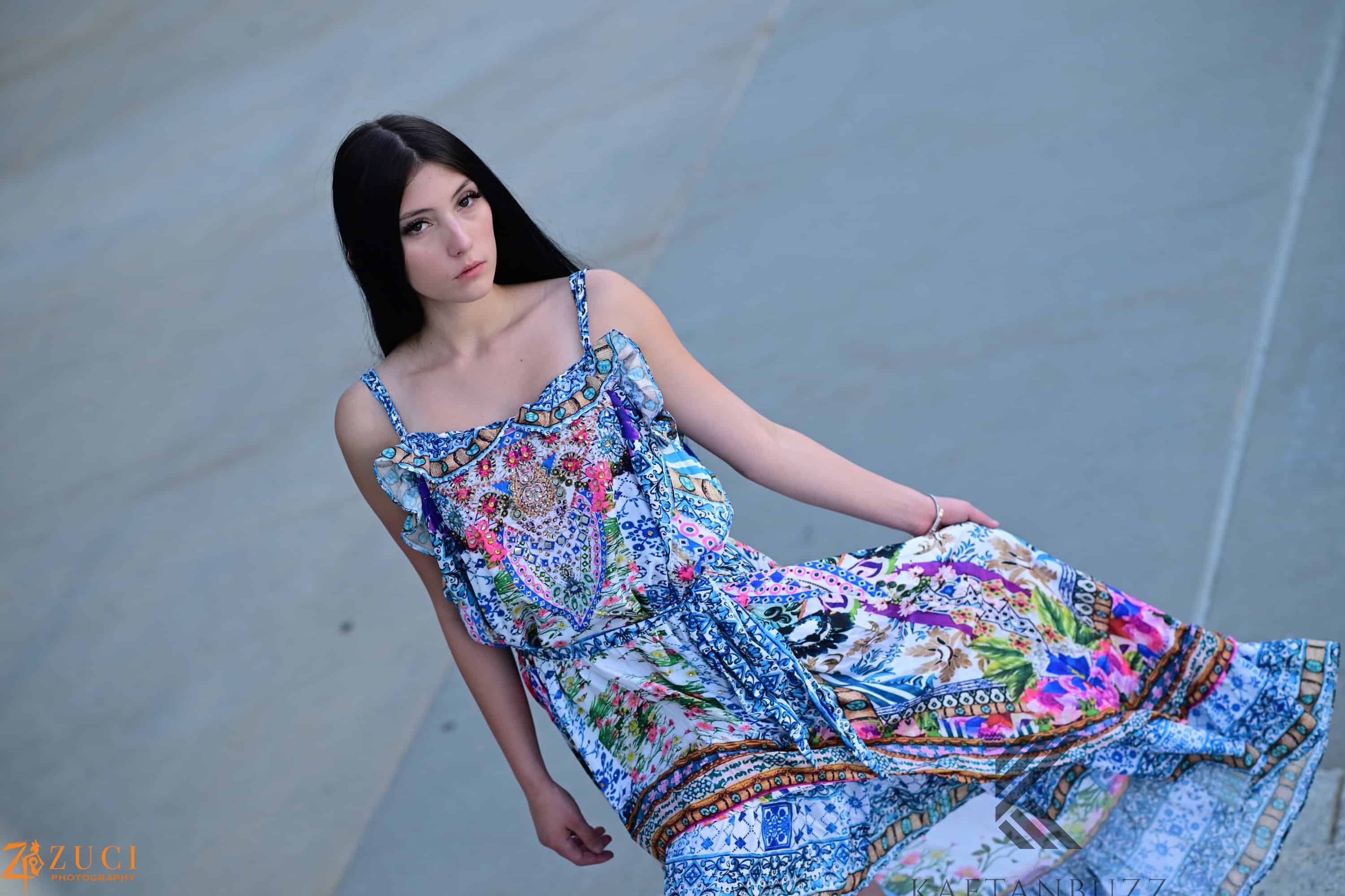 Floral Print Bohemian High Low Goddess Dress featuring a vibrant floral design, high-low hemline, and cinching belt, perfect for summer outings.