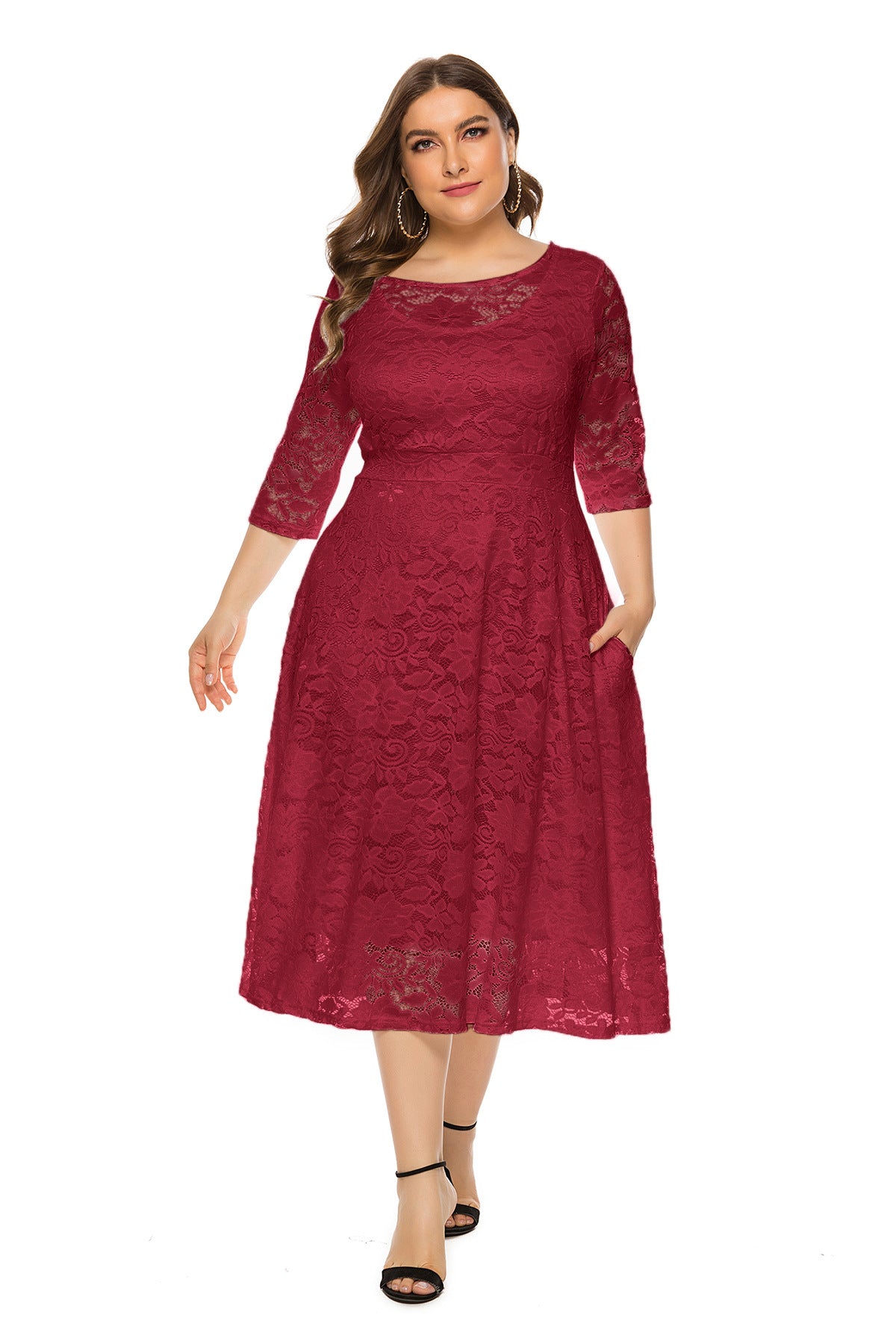 Elegant plus size evening dress featuring a midi cutout lace design with pockets, perfect for special occasions.