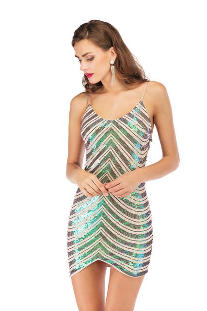 A glamorous sequin dress featuring a stretch sequin skirt, open back design, and beaded spaghetti straps, perfect for summer parties.