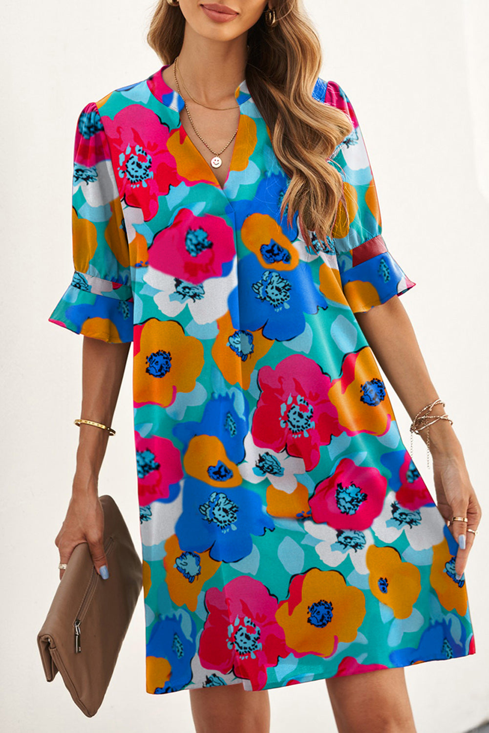 A beautiful Split V Collar Ruffle Floral Shift Dress featuring a vibrant floral print, elegant notch v-neck, and playful ruffled cuffs, perfect for spring and summer.