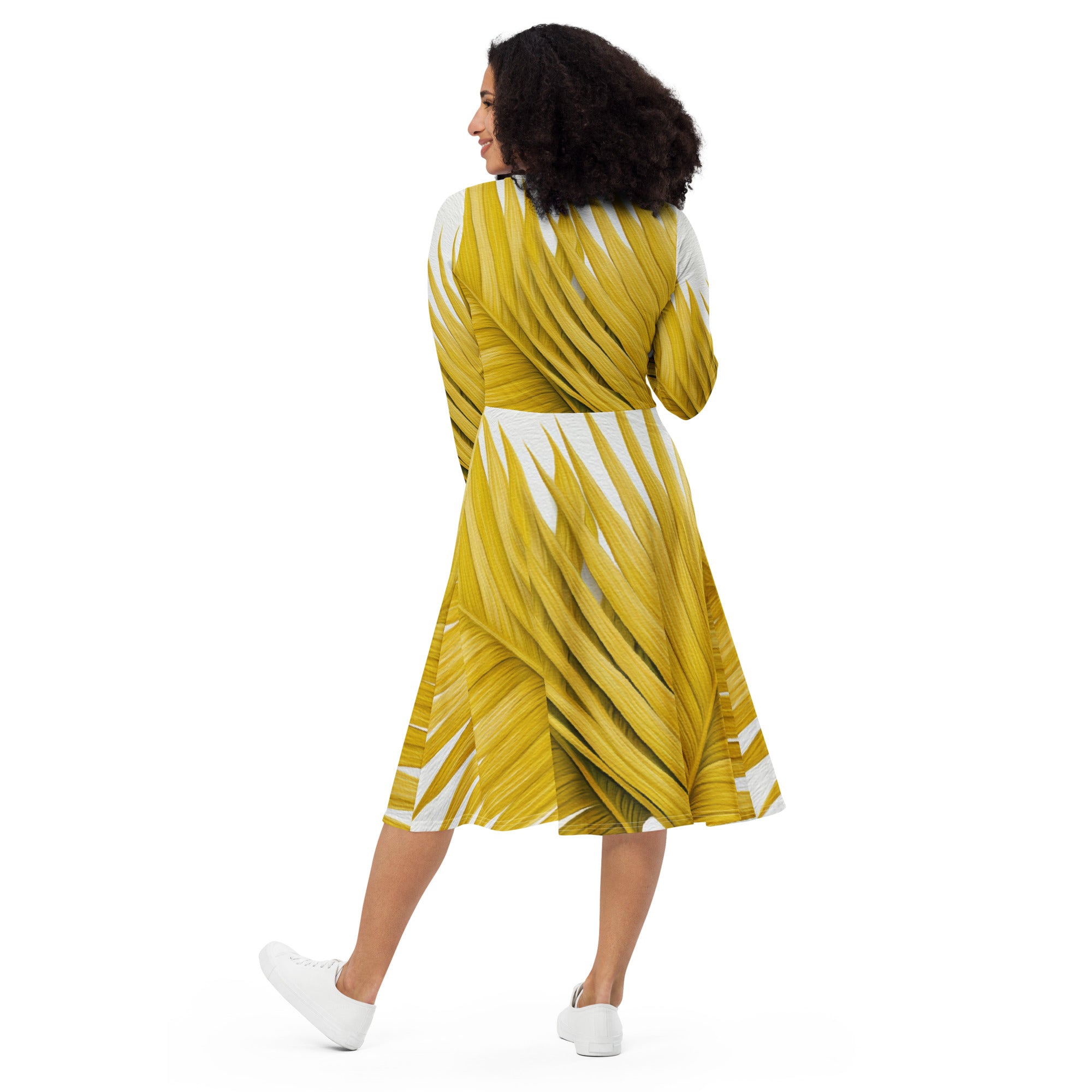 Womens Long Sleeve Midi Dress featuring a vibrant Yellow Palm Leaves pattern, showcasing its fitted waist and flared bottom with side pockets.