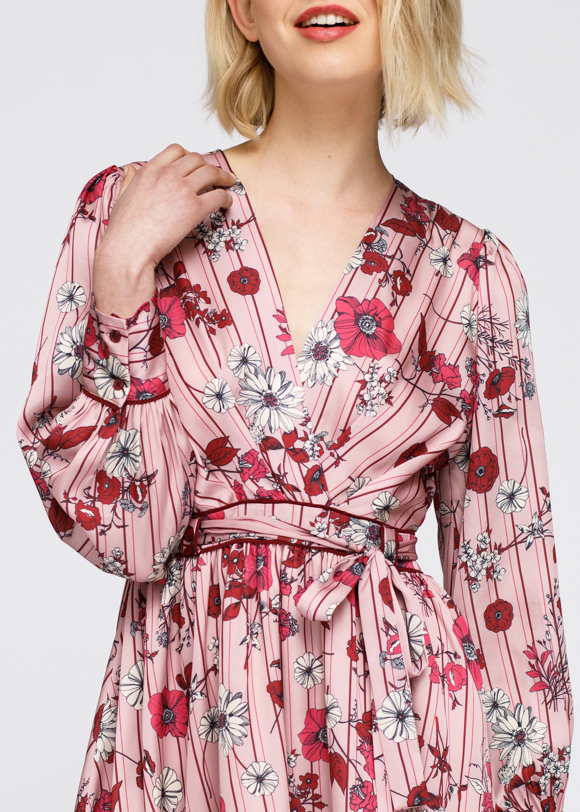 A vibrant Women's Pajama Floral Satin Wrap Front Flared Dress featuring a floral print and self-tie waist strap, perfect for casual outings.