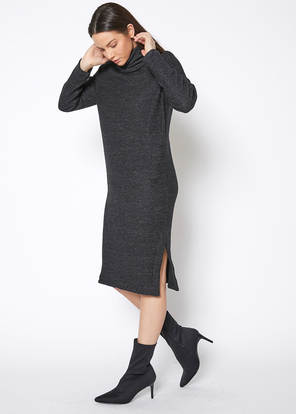 A stylish Women's Turtle Neck Midi Sweater Dress featuring a cozy ribbed texture and elegant side slits, perfect for any occasion.