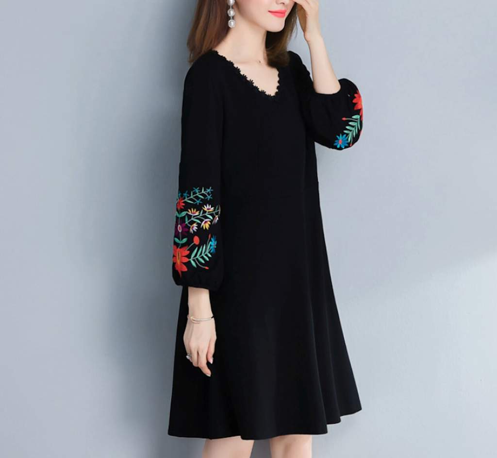 Womens V Neck Dress featuring elegant embroidered sleeves in black, showcasing a stylish and comfortable design.