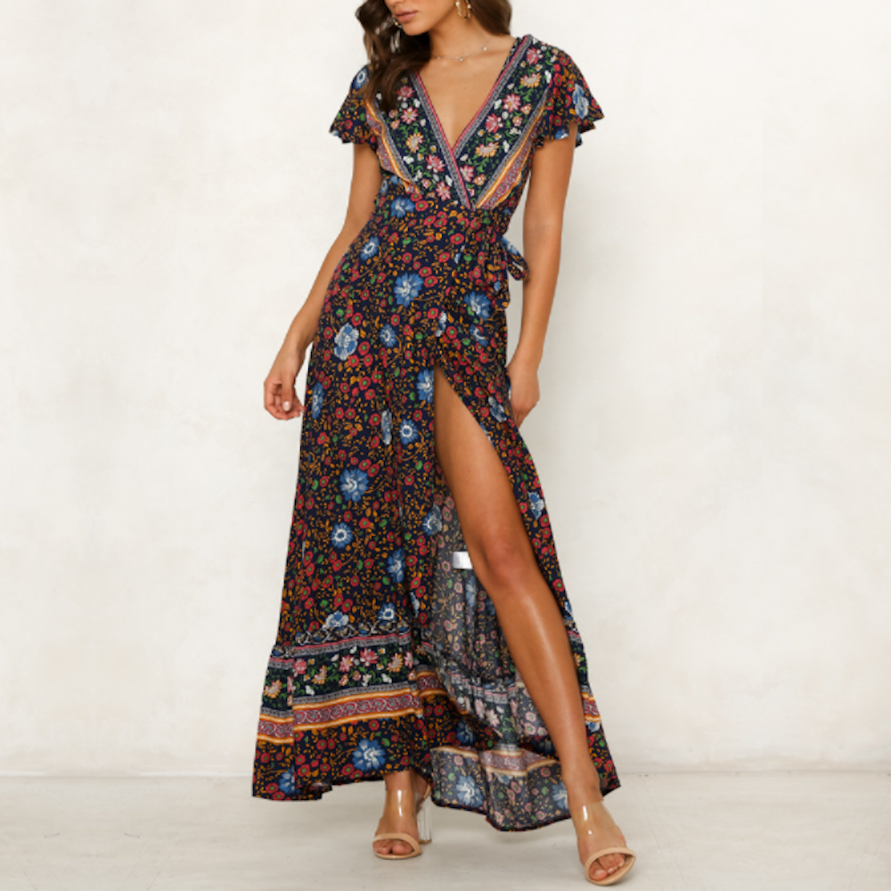 A vibrant Women's Wrap Style V Neck Floral Maxi Dress in red, featuring a floral pattern, perfect for summer outings and beach walks.