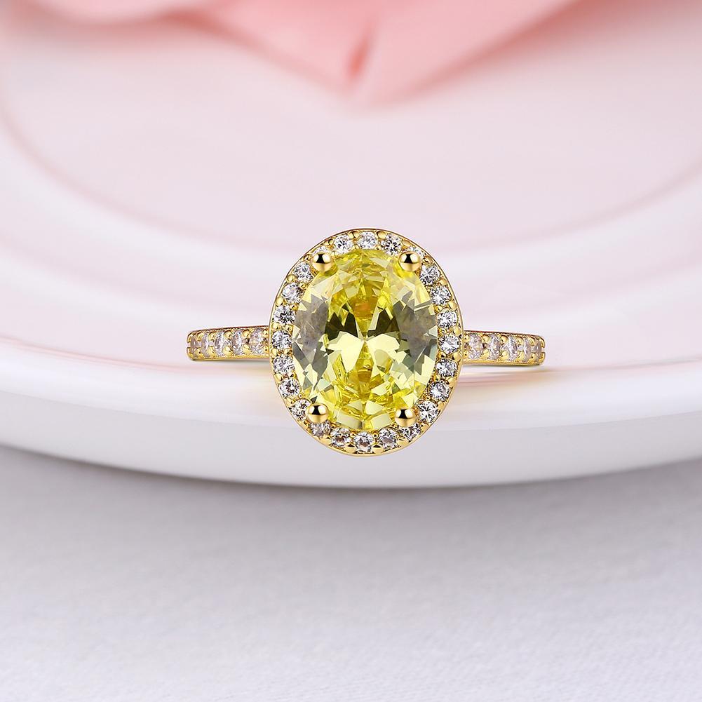 A beautiful Yellow Citrine Princess Cut Pave Halo Gold Ring, featuring a vibrant yellow gemstone surrounded by a sparkling halo, set in 14K gold plated brass.