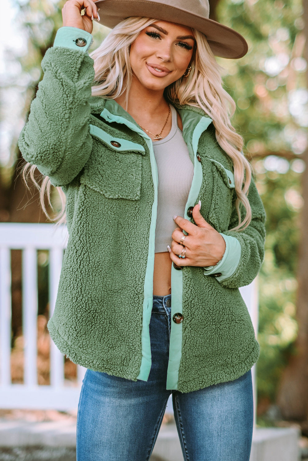 Contrast Button Down Fleece Jacket in solid color with buttoned front and pockets, featuring a collared neck and long sleeves.