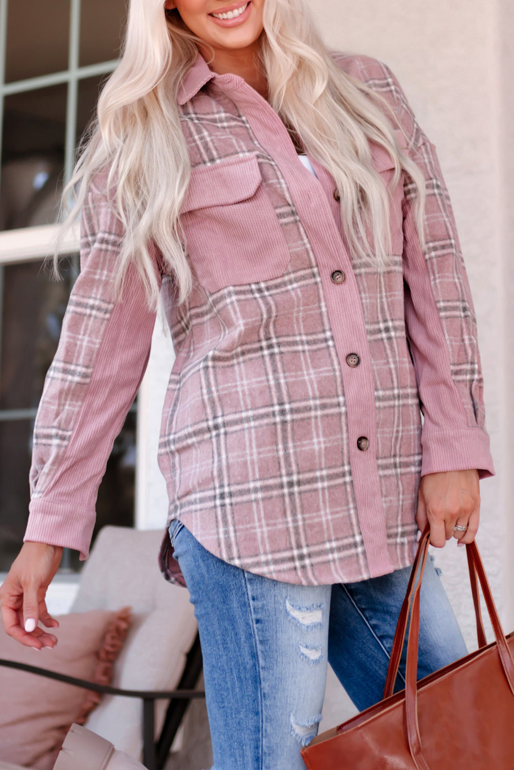 Corduroy plaid pattern shacket featuring a relaxed fit, chest pockets, and button closure, perfect for casual wear.