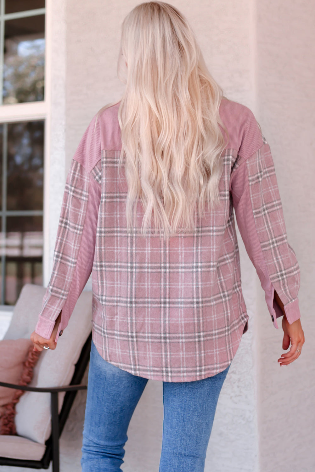 Corduroy plaid pattern shacket featuring a relaxed fit, chest pockets, and button closure, perfect for casual wear.
