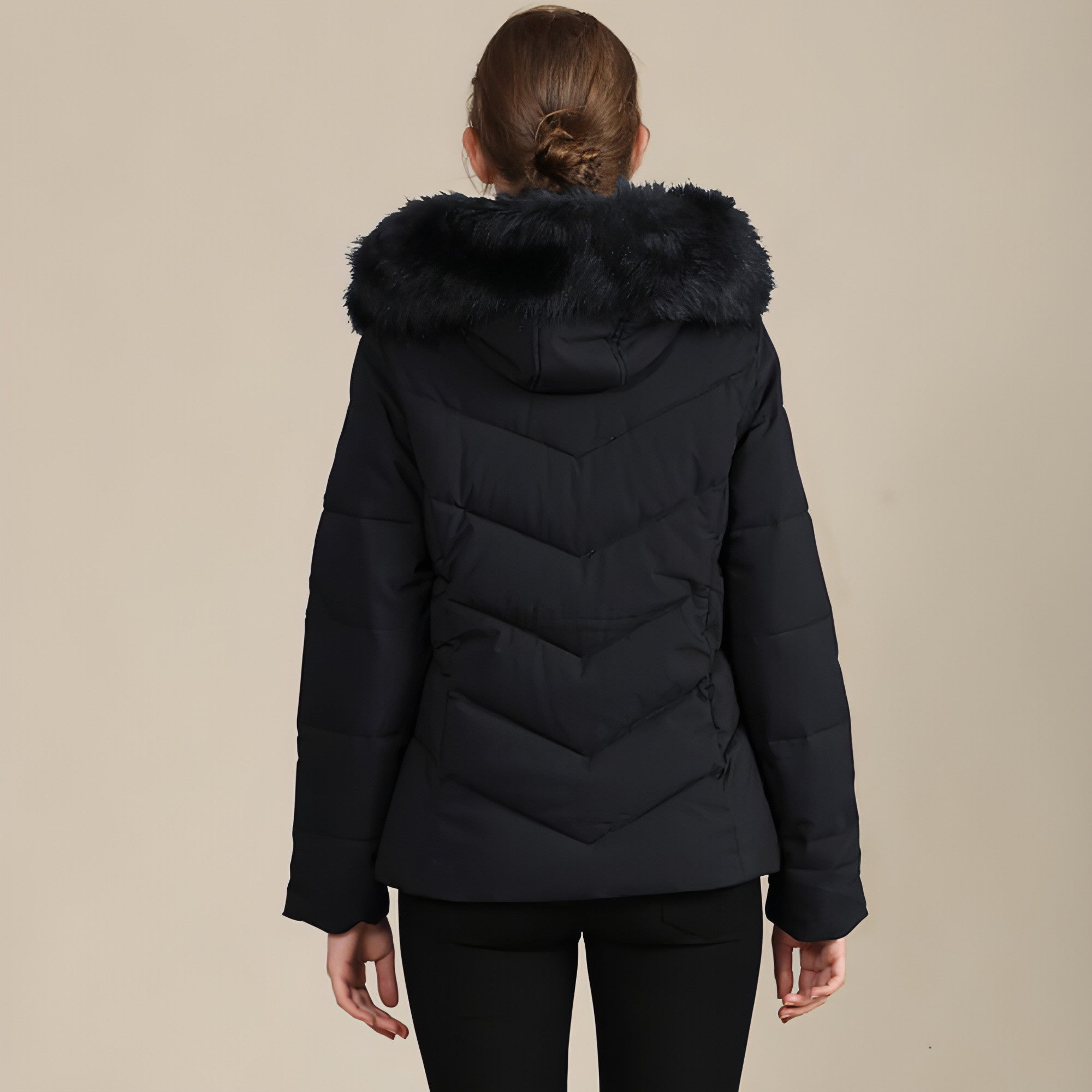 A stylish women's cotton-padded jacket with a standing collar, perfect for cold weather, showcasing its elegant design and warm features.