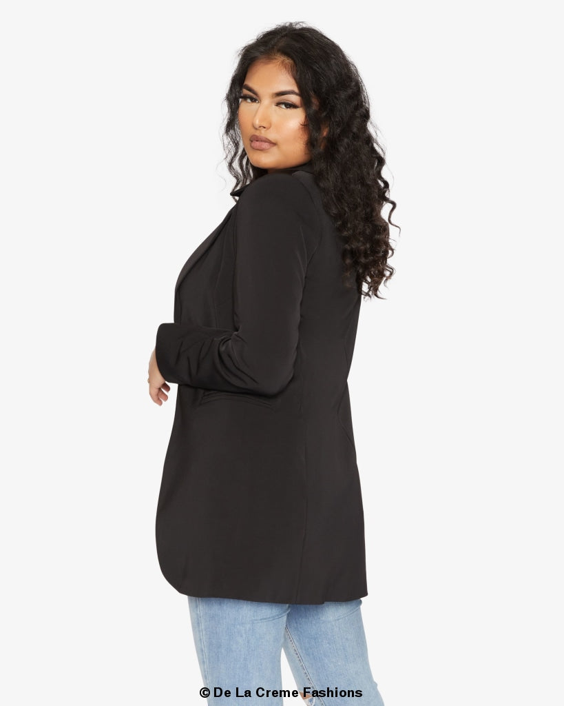 A stylish women's Curved Hem Longline Blazer in a chic design, featuring a flattering silhouette and a modern curved hem.