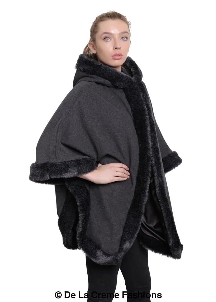 De La Creme Women's Wool & Cashmere Blend Fur Lined Hooded Cape in black, showcasing its luxurious fabric and stylish design.