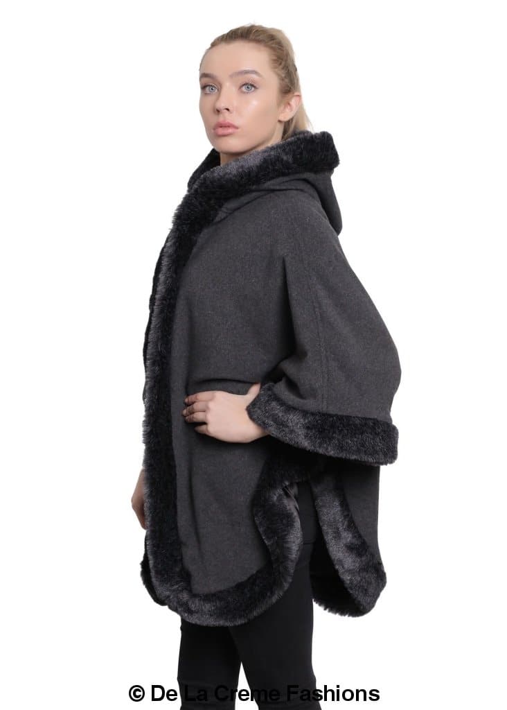 De La Creme Women's Wool & Cashmere Blend Fur Lined Hooded Cape in black, showcasing its luxurious fabric and stylish design.