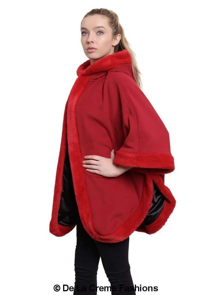 De La Creme Women's Wool & Cashmere Blend Fur Lined Hooded Cape in black, showcasing its luxurious fabric and stylish design.