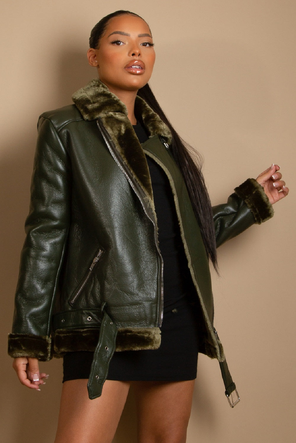 Faux Fur Collar Aviator Jacket featuring a dark tone PU shearling coat with a soft fur collar and cuffs, shiny silver half zip, and side zipped pockets.