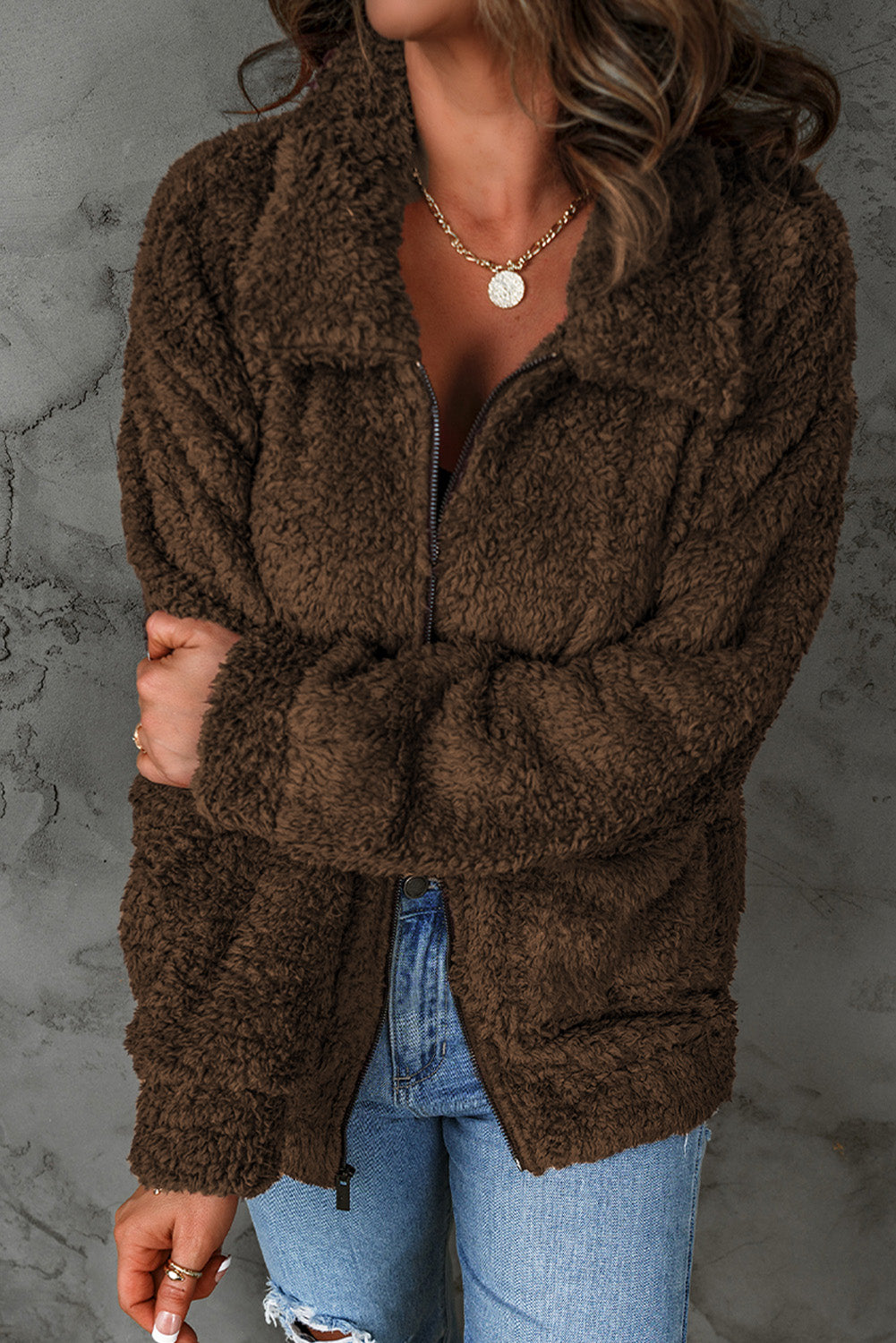 A stylish women's fleece zipper up casual coat in a solid color, featuring large pockets and a turn-down collar, perfect for winter wear.