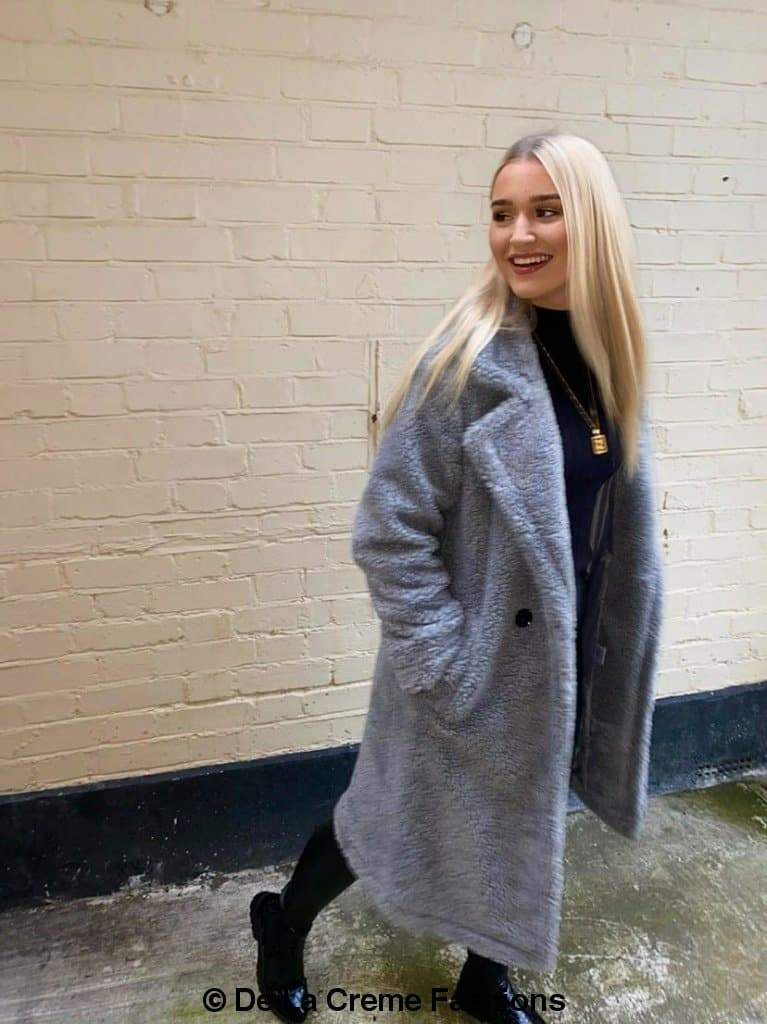 Jackie Double Breasted Borg Teddy Midi Coat in a stylish oversized design with a soft teddy finish, featuring double breasted buttons and side pockets.