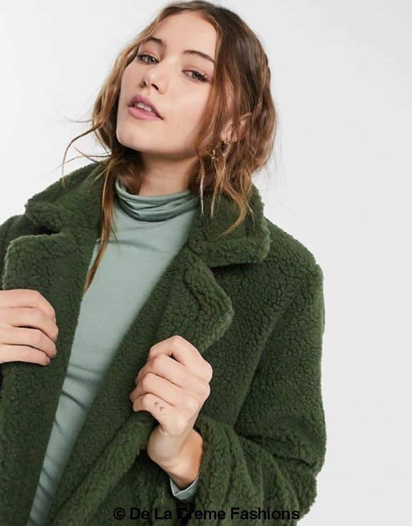 Jackie Double Breasted Borg Teddy Midi Coat in a stylish oversized design with a soft teddy finish, featuring double breasted buttons and side pockets.