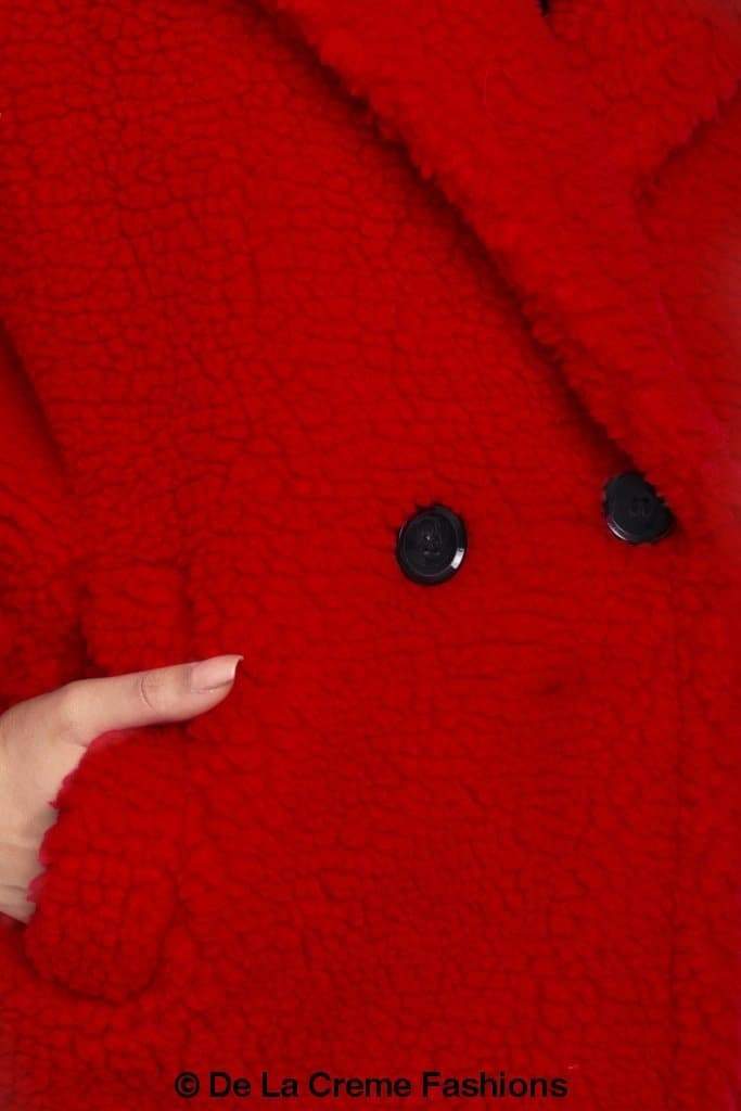 Jackie Double Breasted Borg Teddy Midi Coat in a stylish oversized design with a soft teddy finish, featuring double breasted buttons and side pockets.