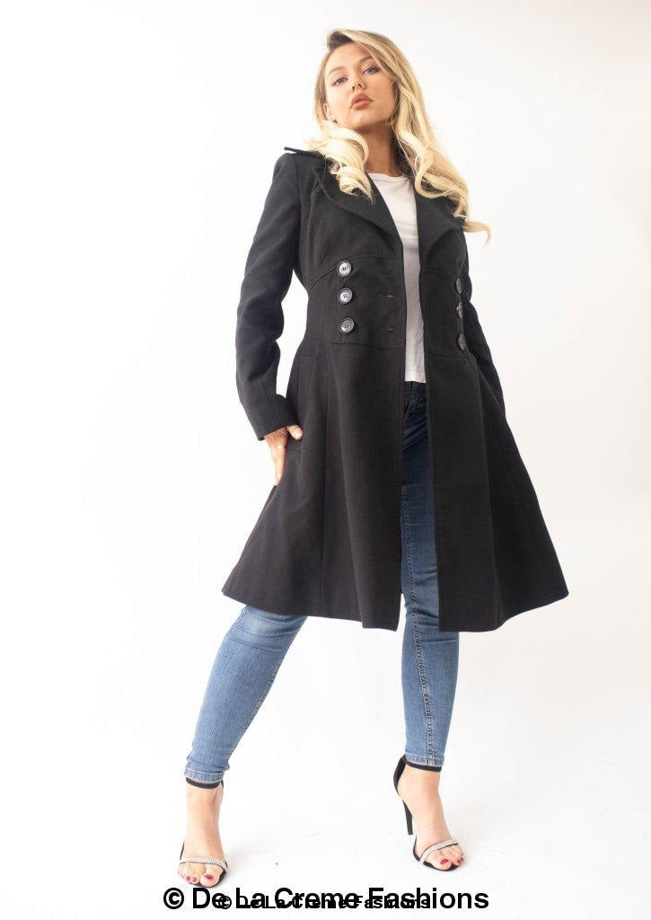 Kirsty Slim Fit A-Line Coat in Black, showcasing double breasted fastening and roll collared V-neckline.